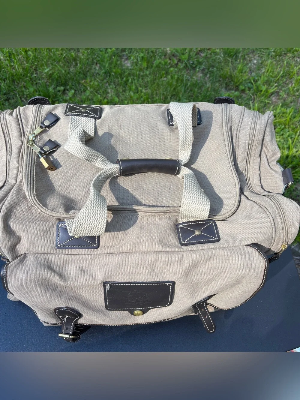 VTG Eddie Bauer Ford Mulholland Brothers Duffel Bag Tan Canvas Leather